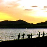 mambatad-sunset_scene_villagers_pulling_nets_copy